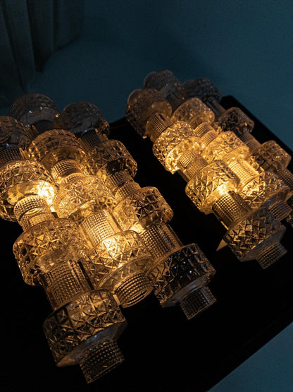 Gert Nyström for Fagerhults Belysning – “Festival”. Pair of wall sconces, Sweden